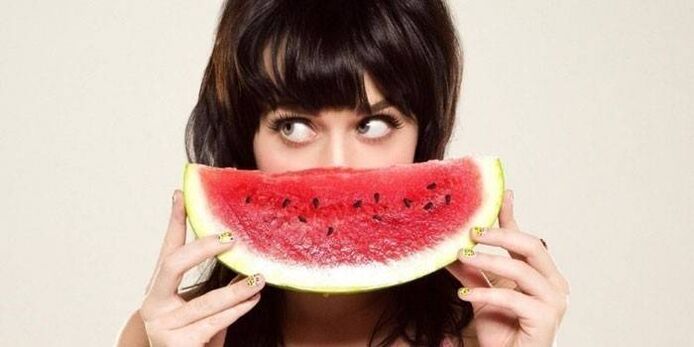 Girl with watermelon on a watermelon diet